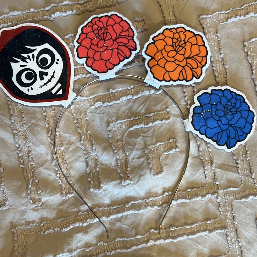 Disney Coco Floral Headband with Red, Orange, and Blue Flowers